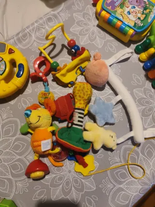 Lote juguetes Bebé: Volante,teléfono,Libro Piano