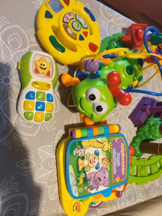 Lote juguetes Bebé: Volante,teléfono,Libro Piano