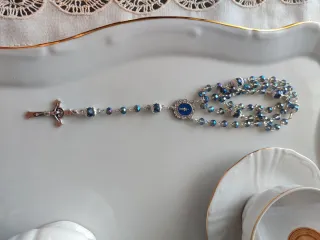 Rosario azul y plateado