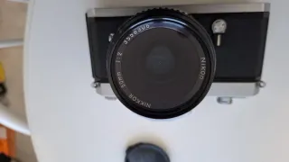 Cámara Nikkormat Analógica Plata y Negra