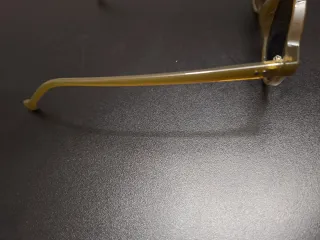 Occhiali da sole rotondi oro e neri