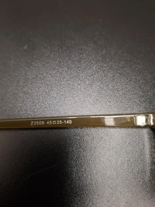 Occhiali da sole rotondi oro e neri