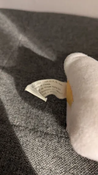 Peluche Snoopy pittore con berretto giallo