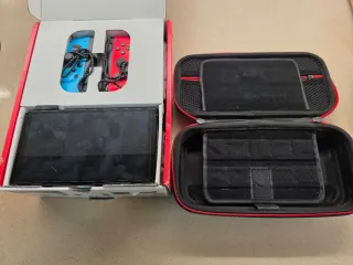 Nintendo Switch OLED con scatola e accessori