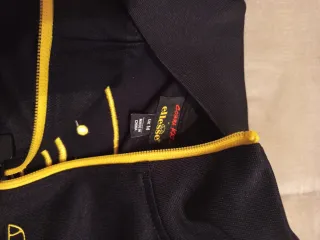 Chaqueta Ellesse Negra y Amarilla