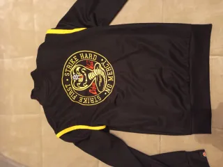 Chaqueta Ellesse Negra y Amarilla