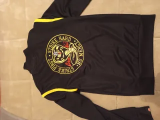 Chaqueta Ellesse Negra y Amarilla