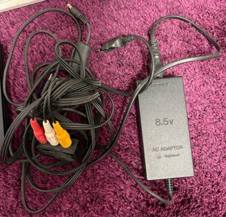 PlayStation 2 con giochi e accessori