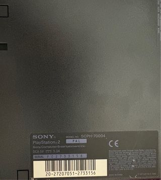 PlayStation 2 con giochi e accessori