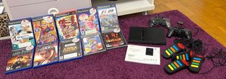 PlayStation 2 con giochi e accessori