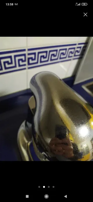 Exprimidor de naranjas metálico