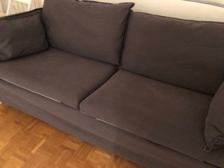 Sofá Ikea gris con fundas lavables