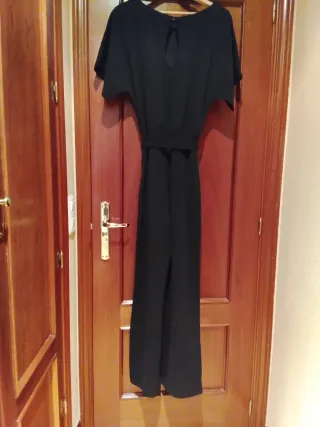 Mono elegante negro mujer