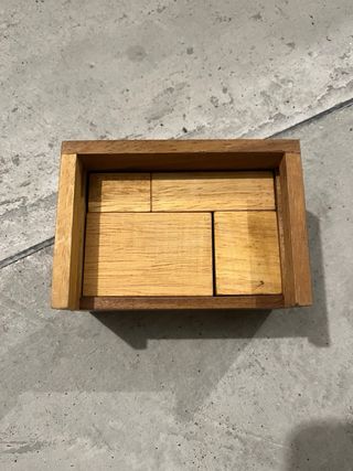 Gioco rompicapo in legno