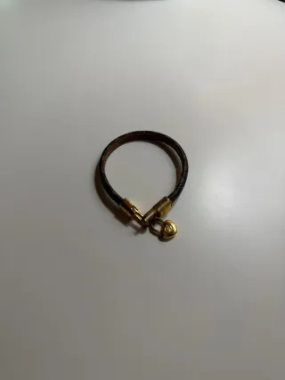 Pulsera Louis Vuitton dorada y marrón