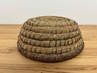 Cesta trenzada redonda Zara Home