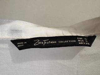 Camisa blanca manga larga abotonada