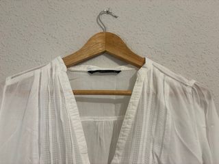 Camisa blanca manga larga abotonada