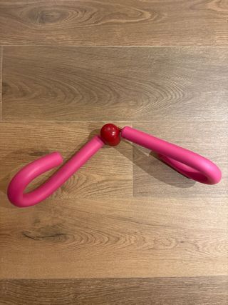 Entrenador glúteos y abductores rosa