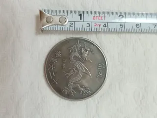 Moneta cinese vintage drago