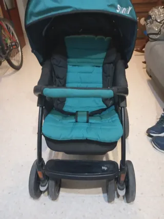Carro de bebé con capota y seguro