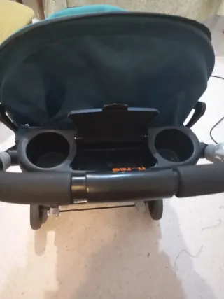 Carro de bebé con capota y seguro