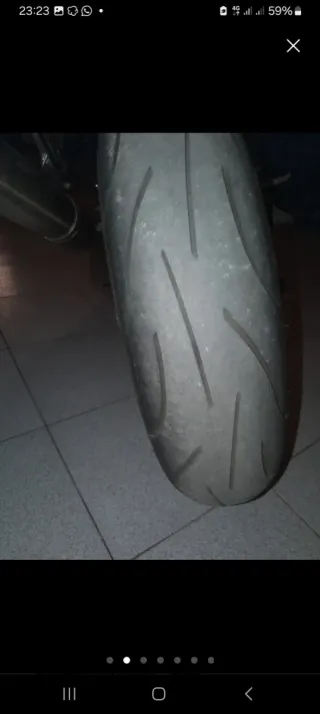 Moto deportiva Aprilia rs125 negra y roja