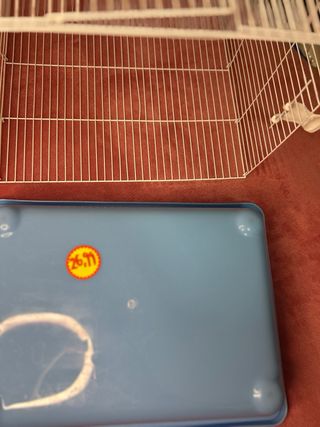 Jaula para pájaros azul y blanca