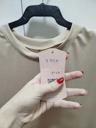 Blusa beige con hombreras Talla L