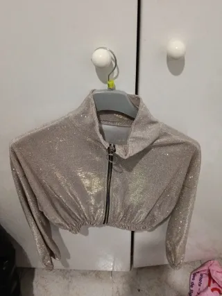 Chaqueta corta brillante dorada/plateada