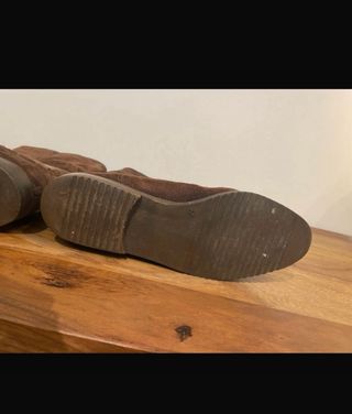 Stivali marroni foderati in pelliccia