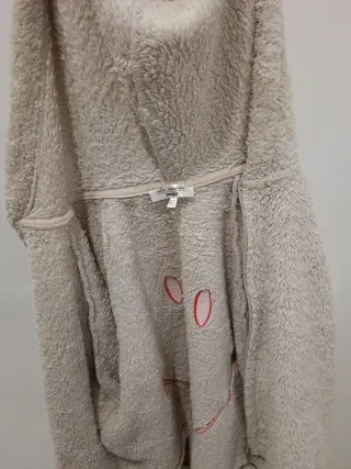 Chaqueta de peluche con cara sonriente