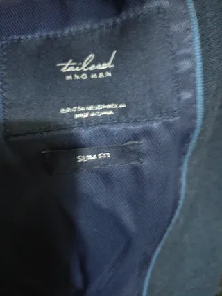 Traje de chaqueta y pantalón azul