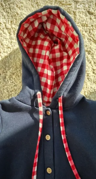 Pelele bebé con capucha