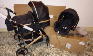 Carrito de bebé y silla coche negro