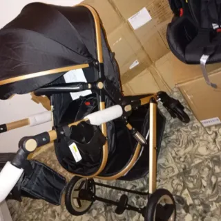 Carrito de bebé y silla coche negro