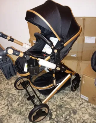 Carrito de bebé y silla coche negro