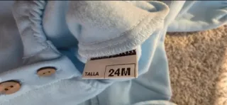 Pelele bebé azul con capucha