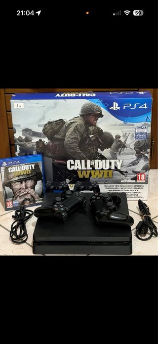 (PlayStation 4 slim) con 2 controller e gioco.