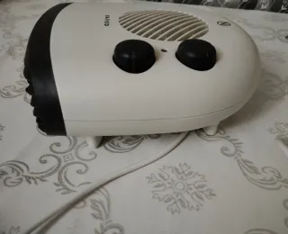 Calefactor blanco y negro