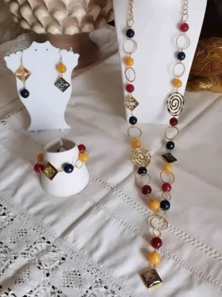 Parure gioielli oro e multicolor