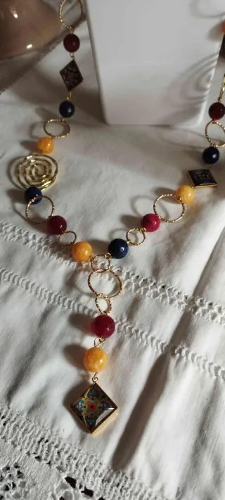 Parure gioielli oro e multicolor