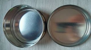 Lote mochila emoji y caja metálica