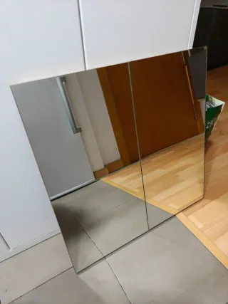 Espejo de cristal y metal