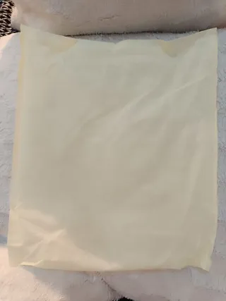 Bolso de peluche beige y marrón