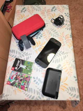 Nintendo Switch + Accesorios y Juegos