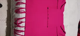 Suéter de lana con cuello alto y flecos