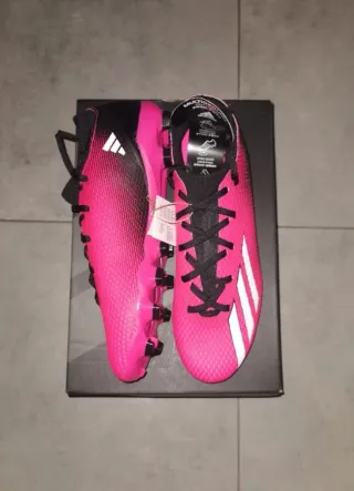 Scarpe da calcio Adidas rosa e bianche