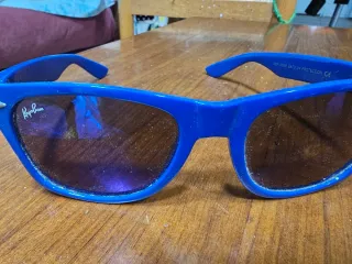 Gafas de sol Ray-Ban rojas y marrones