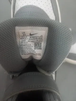 Zapatillas Nike niño grises y blancas